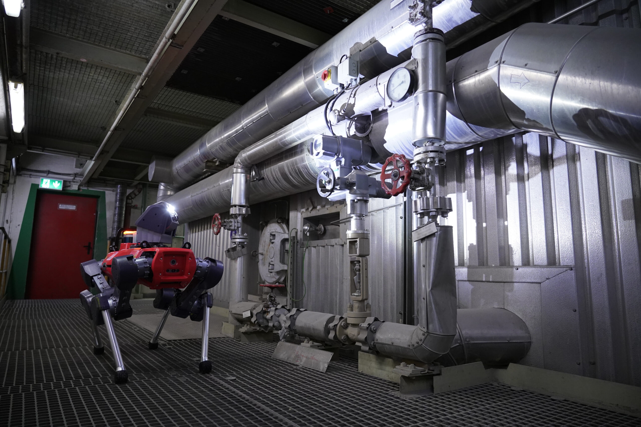 ANYmal conducting a photorealistic digital twin-managed inspection mission at Entega's waste incineration plant.